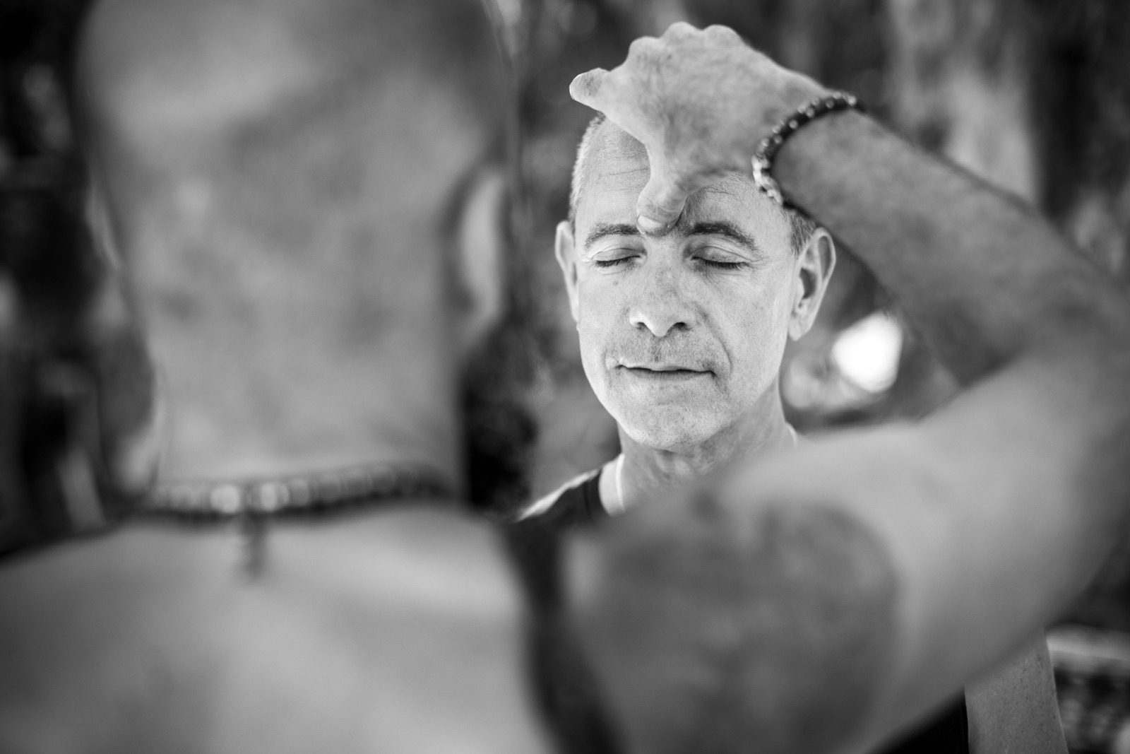 Yossi receiving a blessing during a workshop